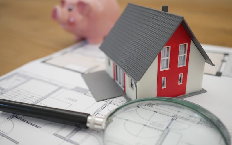 IMT e IMI — Guia Comprar Casa em Portugal 2026